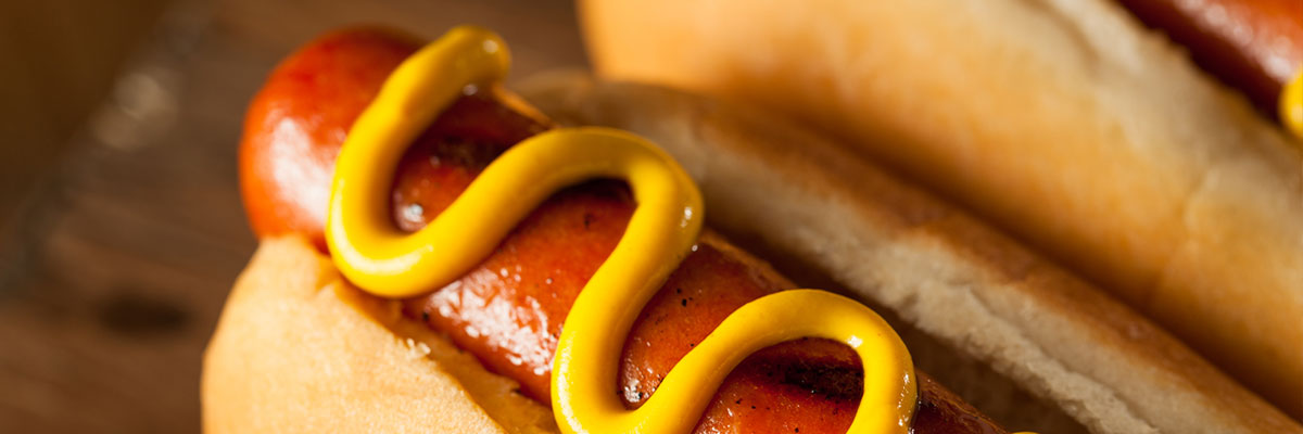 Hot Dog with mustard on it