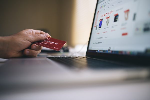 photo of person purchasing with a credit card online