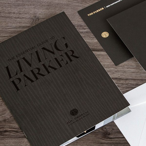 The Parker's brand strategy included marketing collateral like these folders.