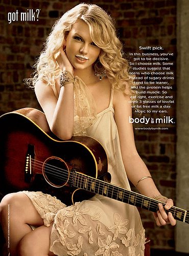Taylor Swift posing for the Got Milk Campaign