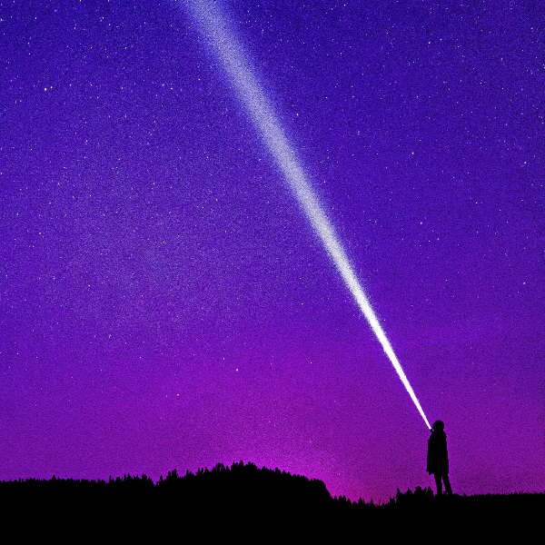 person pointing flashlight at dark purple and blue sky