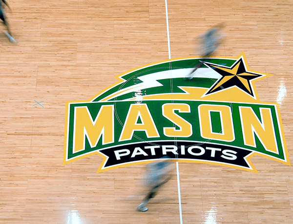 Mason Patriots logo on basketball court